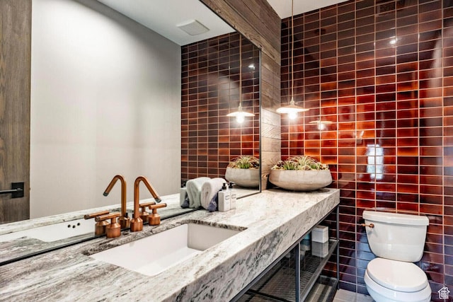 7394 E Moon Light Dr Unit 326A, Heber City, UT 84032 - bathroom featuring tile walls and vanity