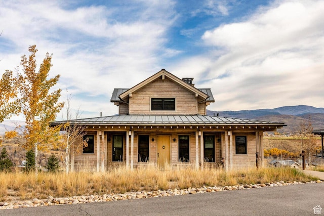 7394 E Moon Light Dr Unit 326A, Heber City, UT 84032 - view of front of house featuring a standing seam roof, covered porch, a metal roof, and a mountain view