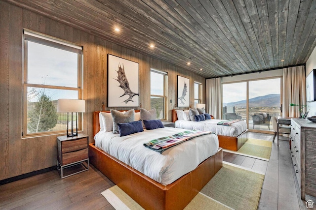 7394 E Moon Light Dr Unit 326A, Heber City, UT 84032 - bedroom with access to outside, hardwood / wood-style flooring, wooden ceiling, multiple windows, and wood walls