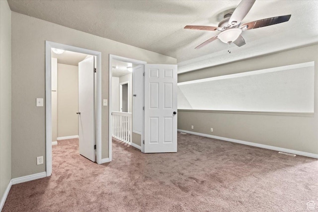 88 W 50 S Unit C9, Centerville, UT 84014 - unfurnished bedroom featuring carpet, a textured ceiling, and ceiling fan