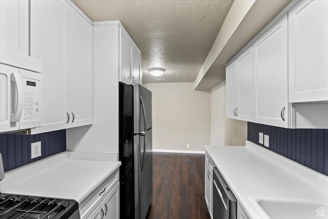 88 W 50 S Unit C9, Centerville, UT 84014 - kitchen featuring stainless steel appliances, a textured ceiling, white cabinets, light countertops, and dark wood-style flooring