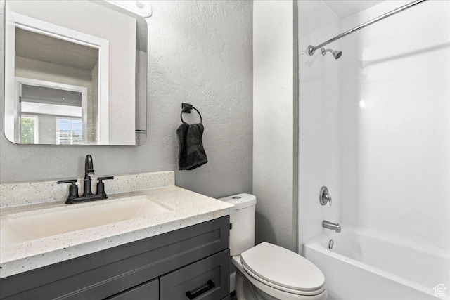 88 W 50 S Unit C9, Centerville, UT 84014 - full bathroom with vanity, a textured wall, and tub / shower combination