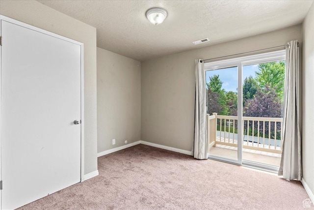 88 W 50 S Unit C9, Centerville, UT 84014 - carpeted empty room featuring a textured ceiling and baseboards
