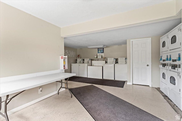 88 W 50 S Unit C9, Centerville, UT 84014 - communal laundry room featuring stacked washer / dryer and washing machine and clothes dryer