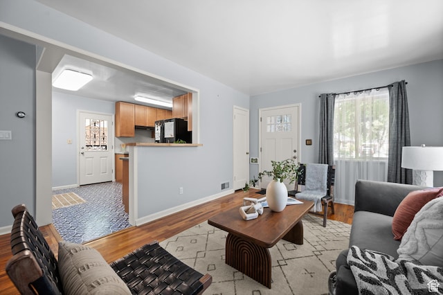 817 N Catherine St, Salt Lake City, UT 84116 - living area with healthy amount of natural light and light wood finished floors