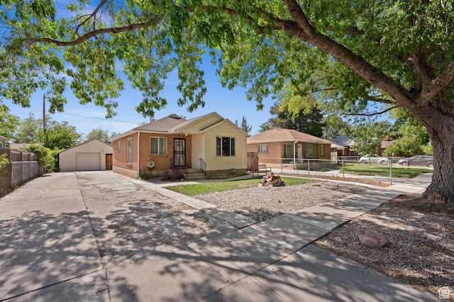 817 N Catherine St, Salt Lake City, UT 84116 - view of front of home with a detached garage, an outdoor structure, driveway, and brick siding