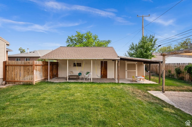 817 N Catherine St, Salt Lake City, UT 84116 - back of house with a fenced backyard, a patio, and a shingled roof