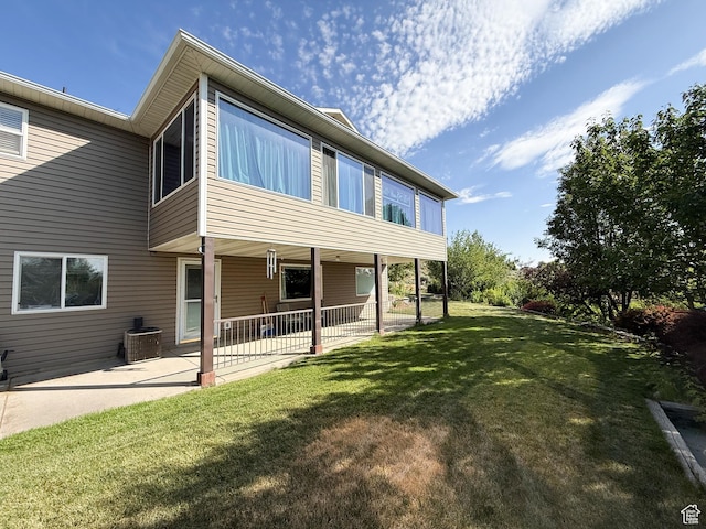 280 W 2400 S, Perry, UT 84302 - rear view of property featuring a patio and a yard