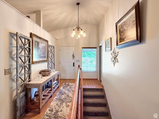 280 W 2400 S, Perry, UT 84302 - entrance foyer with light wood-type flooring, a chandelier, and vaulted ceiling