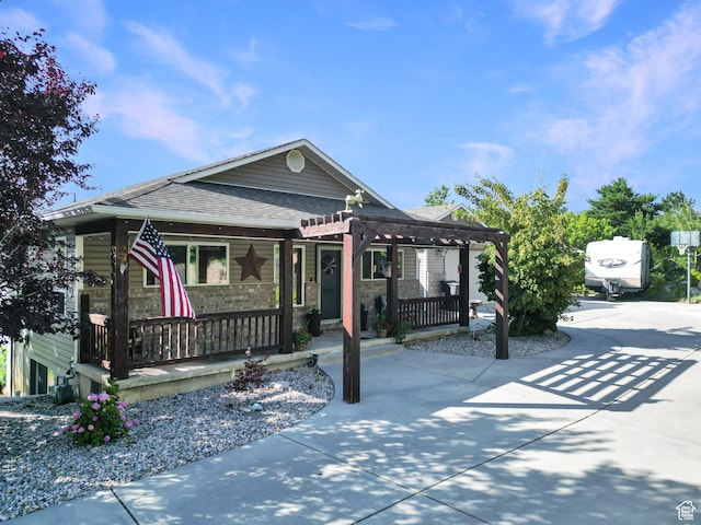 280 W 2400 S, Perry, UT 84302 - view of front of property with a porch, a pergola, and a shingled roof