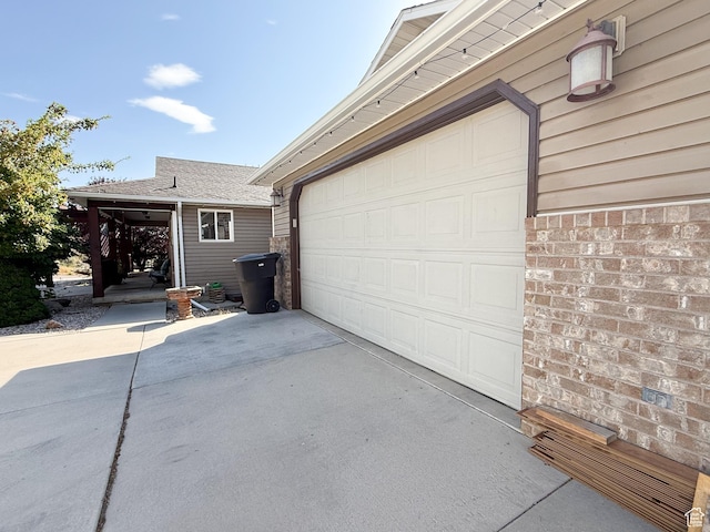 280 W 2400 S, Perry, UT 84302 - garage featuring concrete driveway
