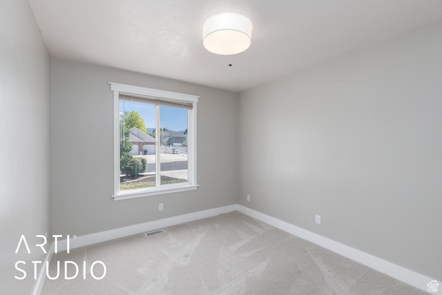 1209 N 1120 W, Clinton, UT 84015 - spare room featuring baseboards and light colored carpet