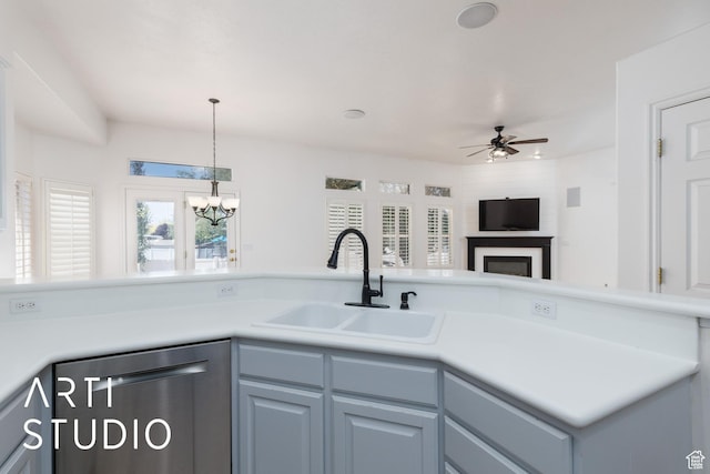 1209 N 1120 W, Clinton, UT 84015 - kitchen with dishwashing machine, a ceiling fan, light countertops, and a chandelier