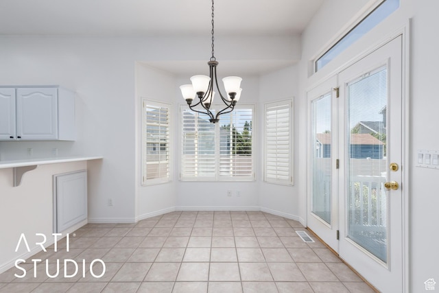 1209 N 1120 W, Clinton, UT 84015 - unfurnished dining area with a chandelier and light tile patterned flooring