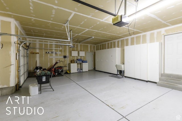 1209 N 1120 W, Clinton, UT 84015 - garage featuring a garage door opener