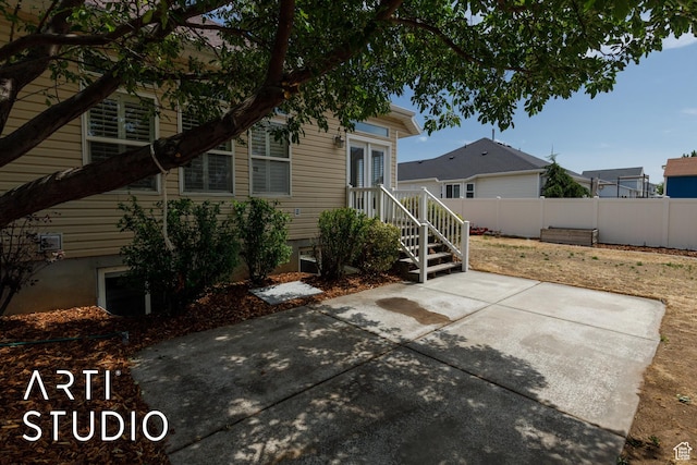 1209 N 1120 W, Clinton, UT 84015 - rear view of property featuring a patio