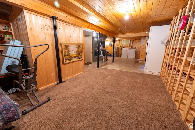 115 N Main St, Malad City, ID 83252 - finished below grade area featuring separate washer and dryer, wooden ceiling, wooden walls, carpet floors, and freestanding refrigerator
