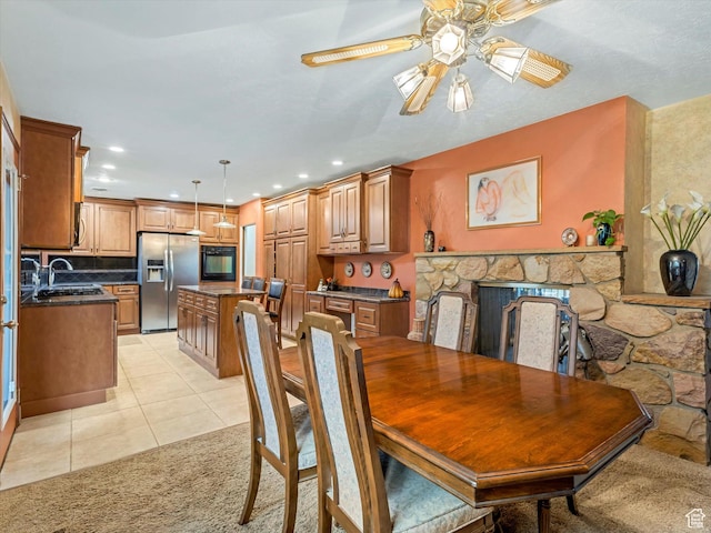 3645 E Fortuna Cir, Salt Lake City, UT 84124 - dining room with ceiling fan, light tile patterned floors, recessed lighting, and light colored carpet