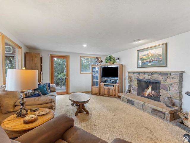 3645 E Fortuna Cir, Salt Lake City, UT 84124 - living room with light carpet and a stone fireplace