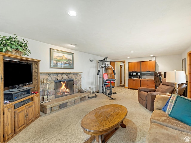 3645 E Fortuna Cir, Salt Lake City, UT 84124 - living room featuring light colored carpet, a stone fireplace, and recessed lighting