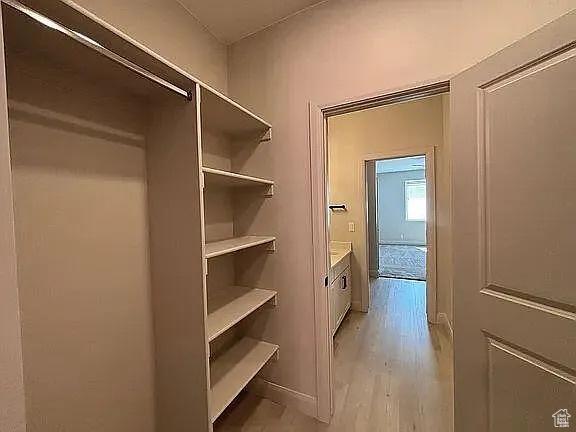 840 N Twin Lakes Dr Unit 414, St George, UT 84790 - walk in closet featuring light wood finished floors