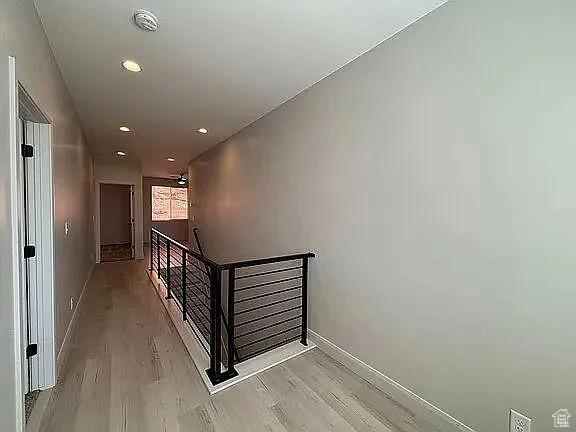 840 N Twin Lakes Dr Unit 414, St George, UT 84790 - hall with an upstairs landing, light wood finished floors, and recessed lighting