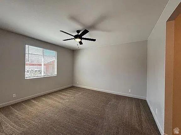 840 N Twin Lakes Dr Unit 414, St George, UT 84790 - carpeted spare room with a ceiling fan and baseboards
