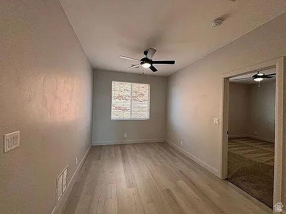 840 N Twin Lakes Dr Unit 414, St George, UT 84790 - spare room featuring ceiling fan and light wood-type flooring