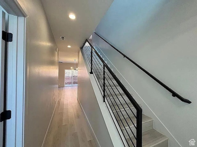 840 N Twin Lakes Dr Unit 414, St George, UT 84790 - stairway with wood finished floors, recessed lighting, and a chandelier