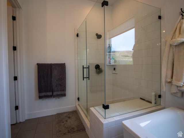 4821 W Juniper Bend Cir Unit 101, Herriman, UT 84096 - full bathroom with a shower stall and tile patterned flooring