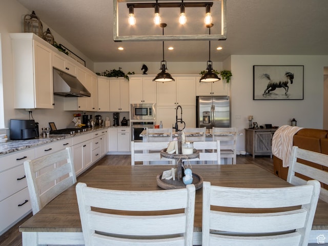 4821 W Juniper Bend Cir Unit 101, Herriman, UT 84096 - dining room featuring recessed lighting and dark wood-type flooring