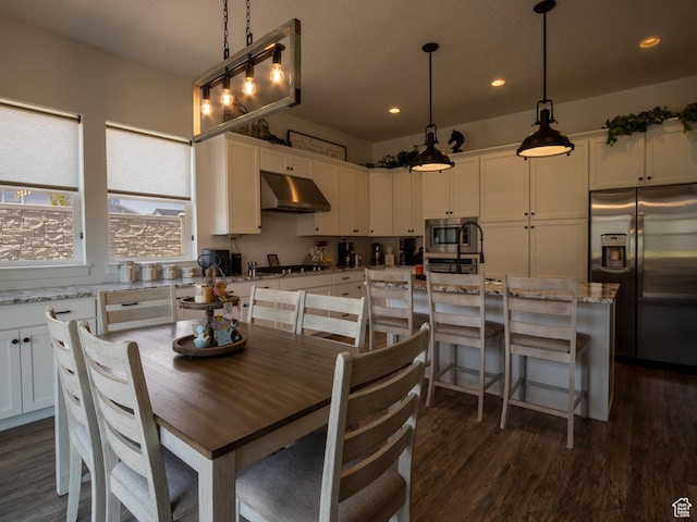 4821 W Juniper Bend Cir Unit 101, Herriman, UT 84096 - dining space with recessed lighting and dark wood-type flooring