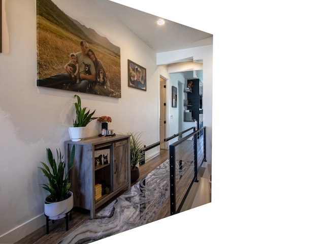 4821 W Juniper Bend Cir Unit 101, Herriman, UT 84096 - corridor with wood finished floors and an upstairs landing