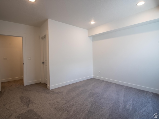 4821 W Juniper Bend Cir Unit 101, Herriman, UT 84096 - spare room with carpet floors and recessed lighting
