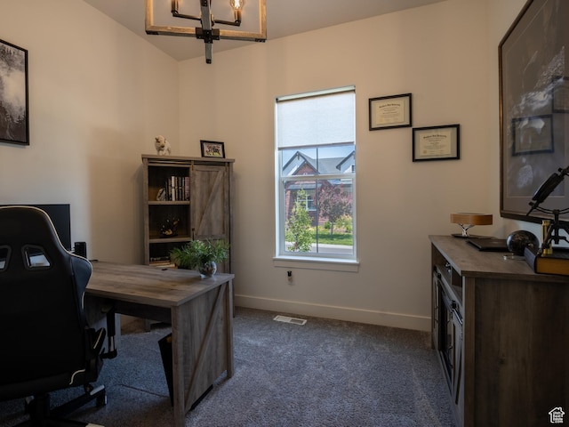4821 W Juniper Bend Cir Unit 101, Herriman, UT 84096 - home office featuring dark colored carpet and a chandelier