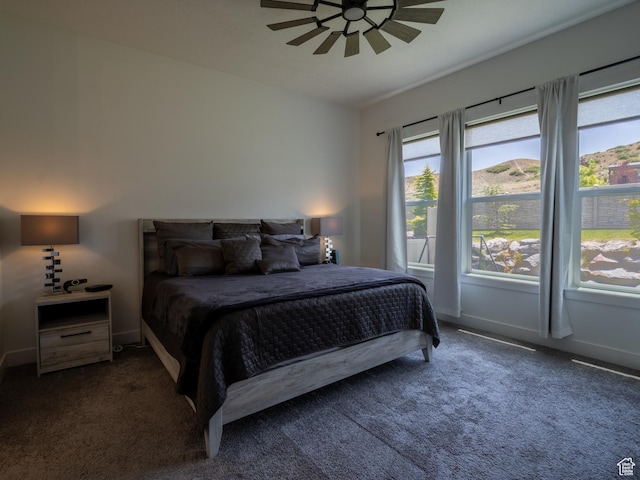 4821 W Juniper Bend Cir Unit 101, Herriman, UT 84096 - bedroom featuring carpet flooring and ceiling fan