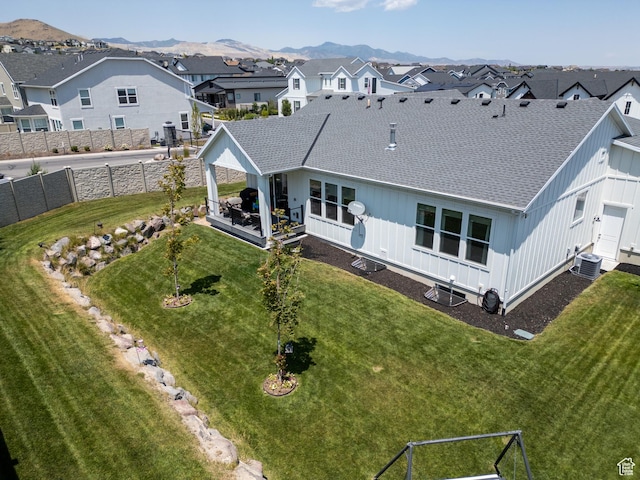 4821 W Juniper Bend Cir Unit 101, Herriman, UT 84096 - aerial view of residential area featuring a mountain backdrop