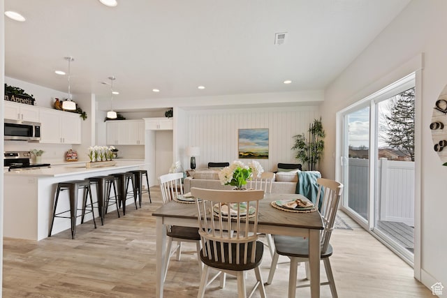 1695 W 2770 S Unit 203, Syracuse, UT 84075 - dining space with light wood-style flooring and recessed lighting