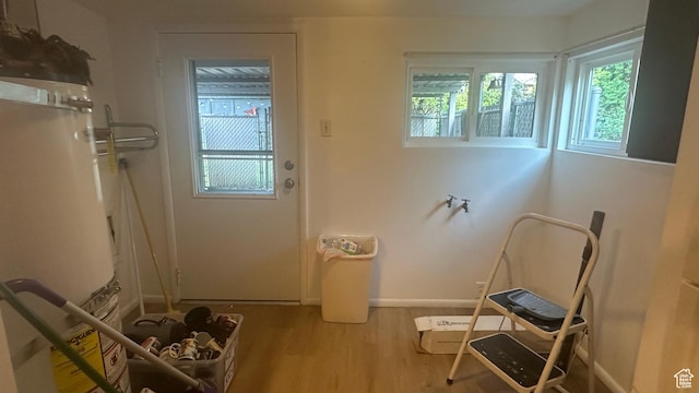 472 N 500 W, Logan, UT 84321 - doorway to outside featuring wood finished floors and baseboards