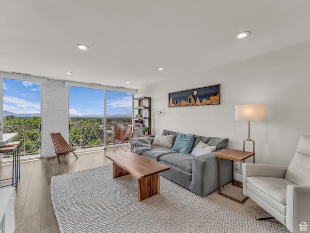 777 E S Temple Unit 5A, Salt Lake City, UT 84102 - living room featuring wood finished floors and recessed lighting