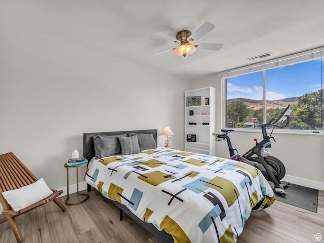 777 E S Temple Unit 5A, Salt Lake City, UT 84102 - bedroom featuring wood finished floors and ceiling fan