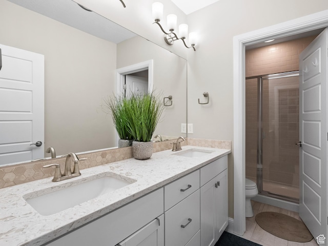 6412 W Chan Reese Dr, West Jordan, UT 84081 - bathroom with double vanity, a shower stall, and tile patterned floors