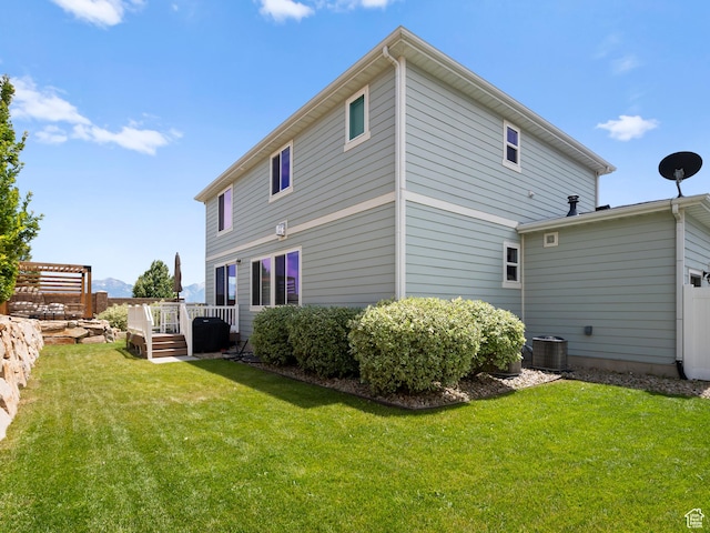 6412 W Chan Reese Dr, West Jordan, UT 84081 - back of house with a wooden deck and a yard