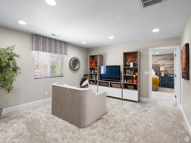 6412 W Chan Reese Dr, West Jordan, UT 84081 - living area featuring light colored carpet, recessed lighting, and a textured ceiling