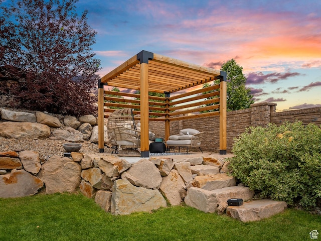 6412 W Chan Reese Dr, West Jordan, UT 84081 - patio terrace at dusk featuring a pergola and a patio area