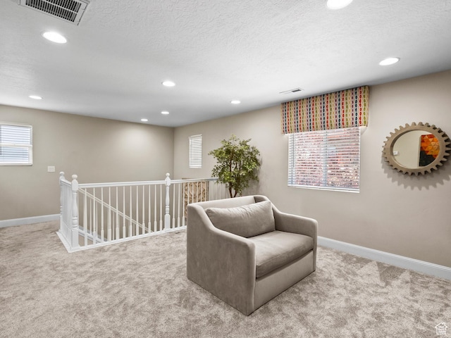6412 W Chan Reese Dr, West Jordan, UT 84081 - living area featuring carpet, recessed lighting, healthy amount of natural light, an upstairs landing, and a textured ceiling