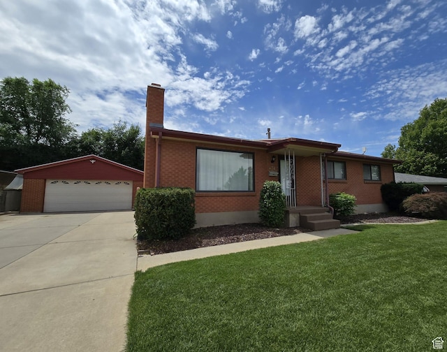 638 E 1050 N, Bountiful, UT 84010 - ranch-style house with brick siding, a chimney, a front yard, and an outdoor structure