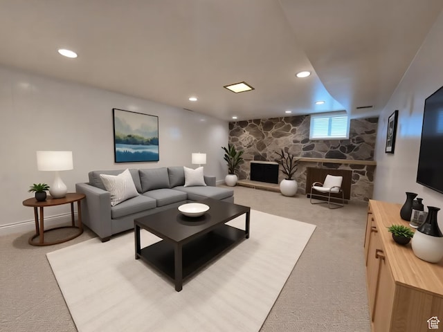 638 E 1050 N, Bountiful, UT 84010 - living room with light carpet, a stone fireplace, and recessed lighting