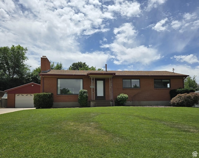 638 E 1050 N, Bountiful, UT 84010 - single story home featuring brick siding, a chimney, and a front lawn