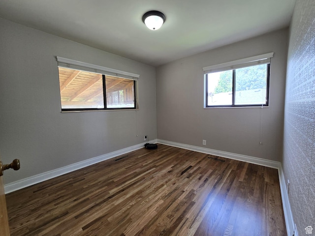 638 E 1050 N, Bountiful, UT 84010 - unfurnished room with dark wood finished floors and baseboards